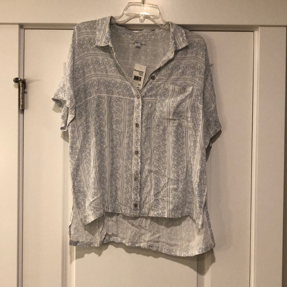 Lightweight white button down top with light blue design.